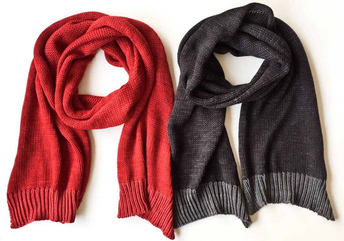 Two hand knit wool scarves in Cowgirlblues Merino DK yarn colours Chilli Pepper and Charcoal