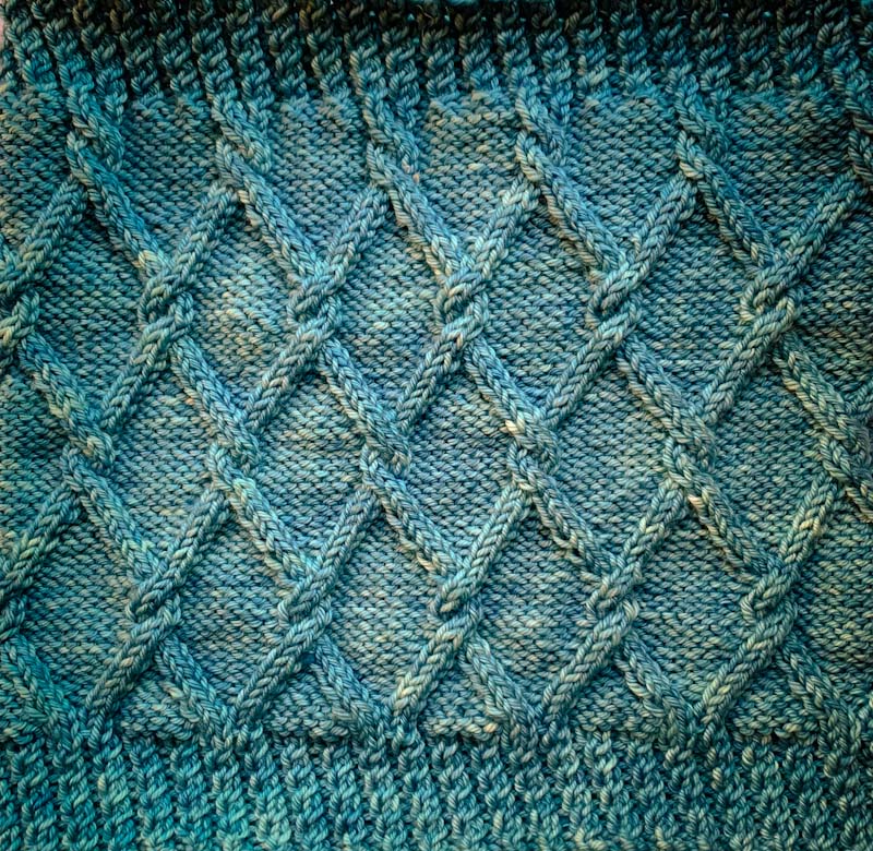 Trellis Cable hand knit in Cowgirlblues Merino DK