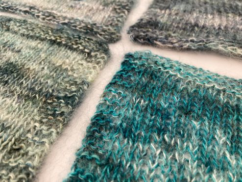 Four knit swatches illustrating marled yarn colour combinations in Cowgirlblues single lace and kidsilk yarns